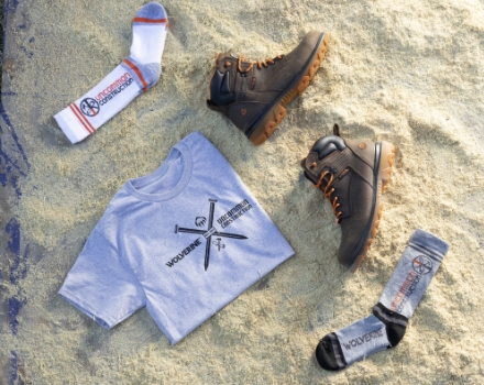 Apparel layed out in the sand.