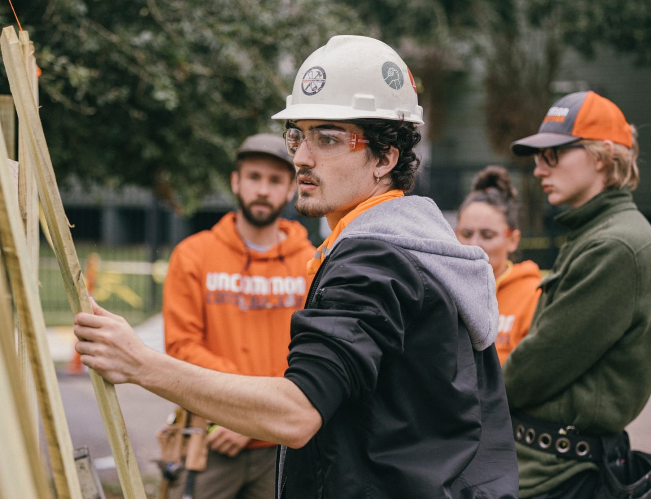 Studetns working on a construction site