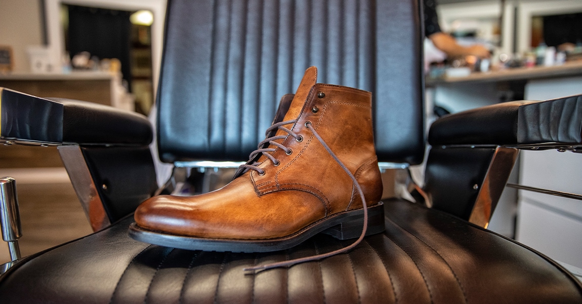 Wolverine BLVD Plain Toe in tan on a barber chair