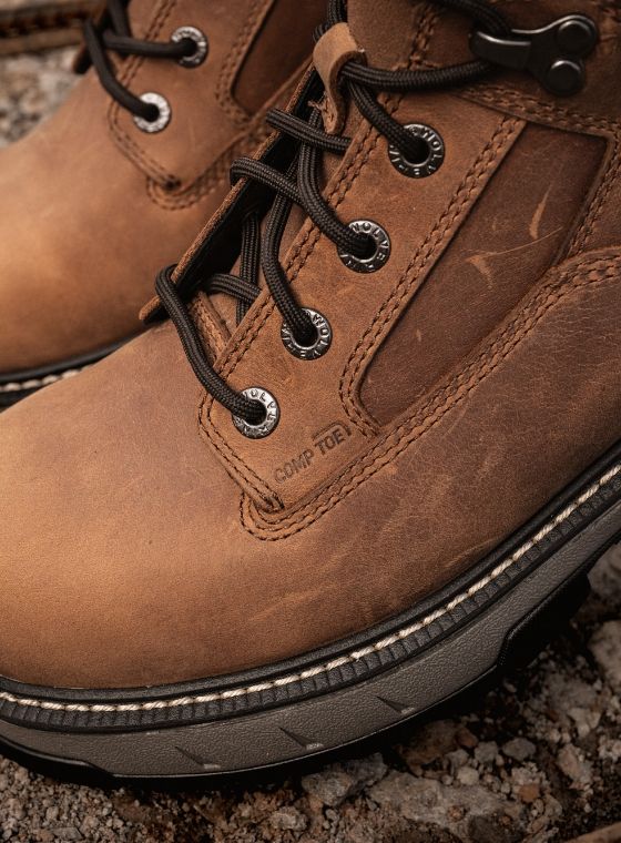 a close up of a brown boot