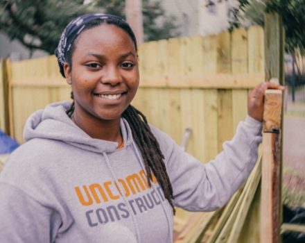Student building a fence.