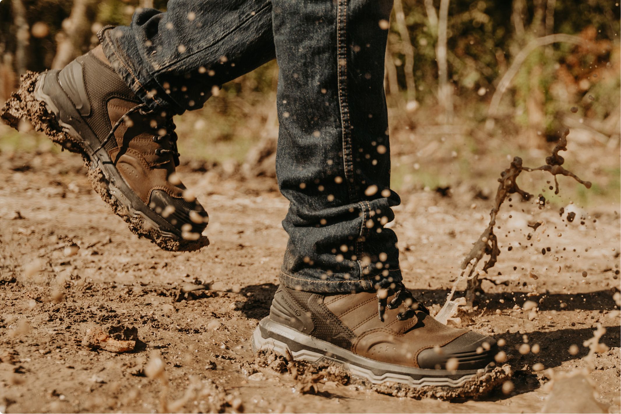 Boots splashing through mud.