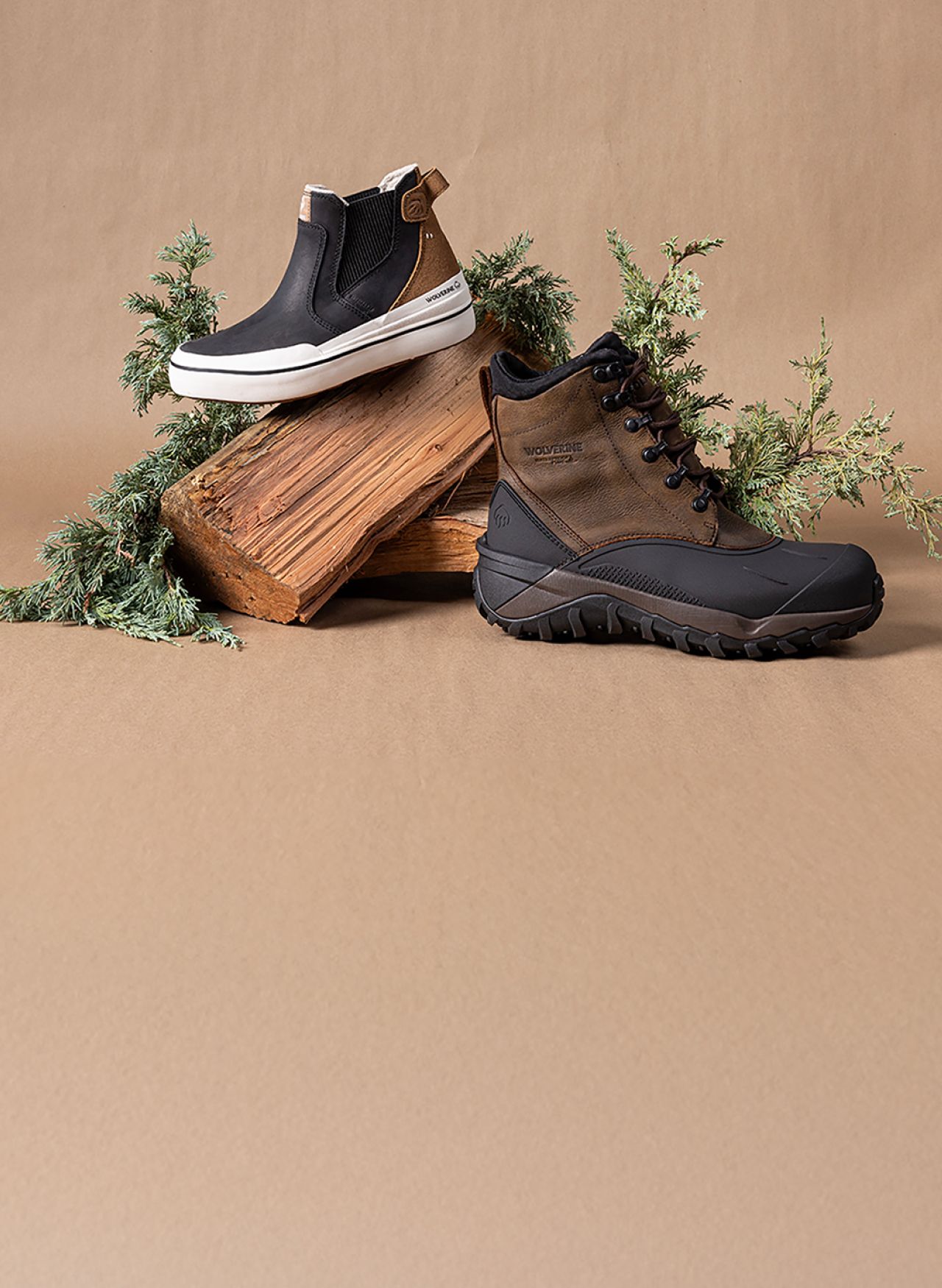 a pair of boots on a log