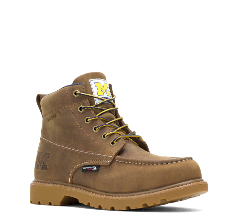 a tan boot with a Michigan block M on the tongue