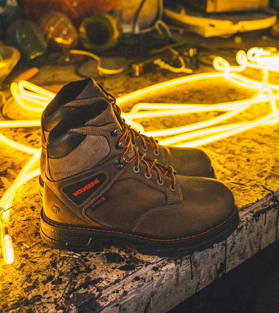 A pair of Wolverine boots next to one of Matt's creations.