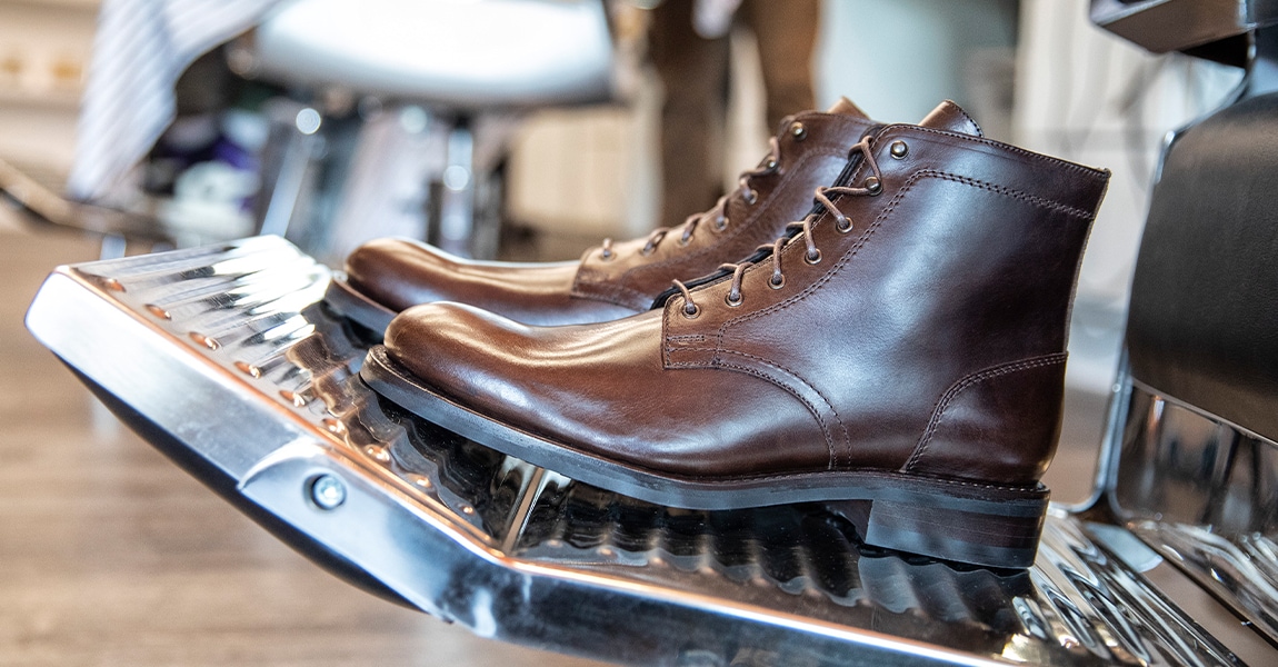 Wolverine BLVD Plain Toe in brown on a barber stool