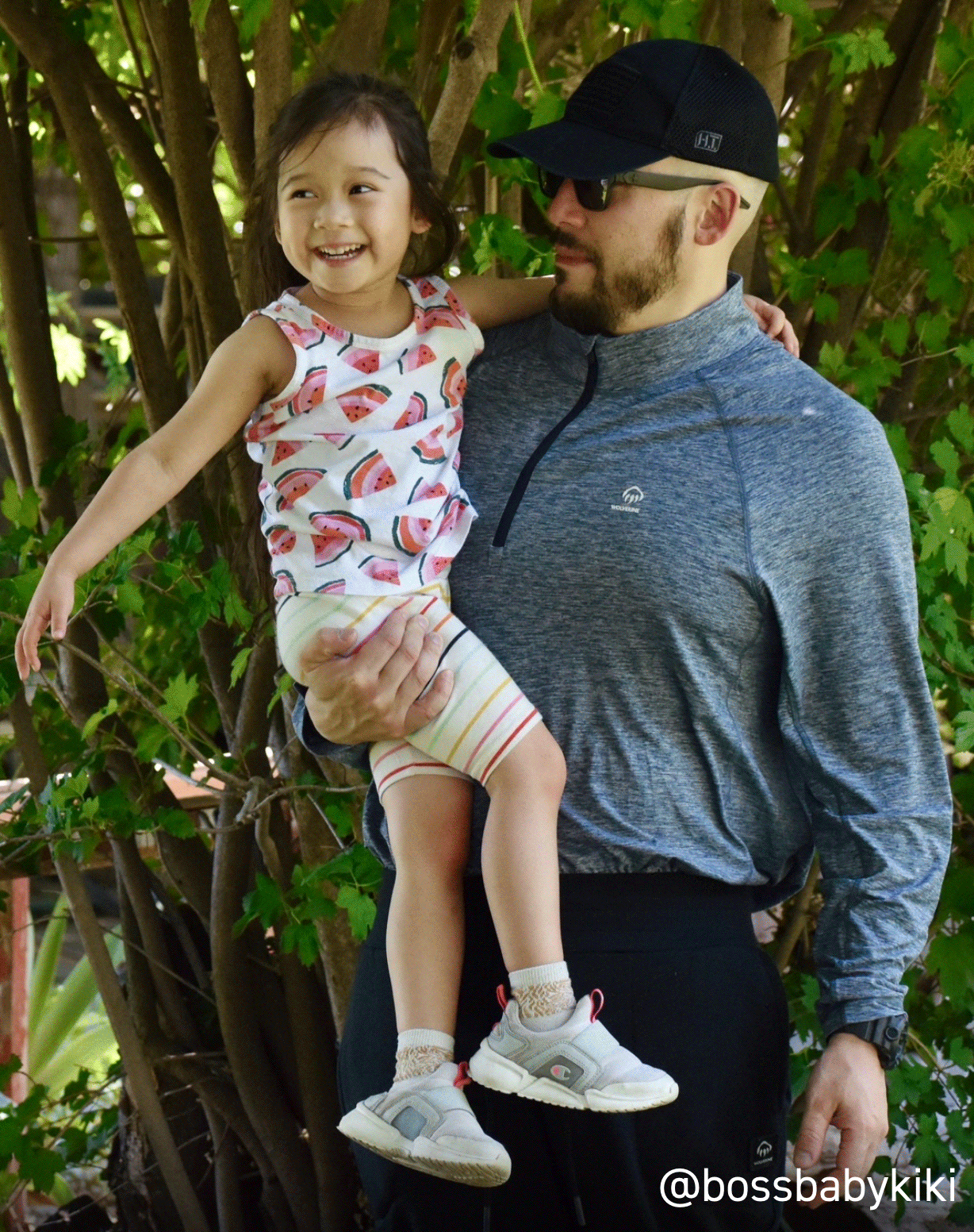 a man holding a child