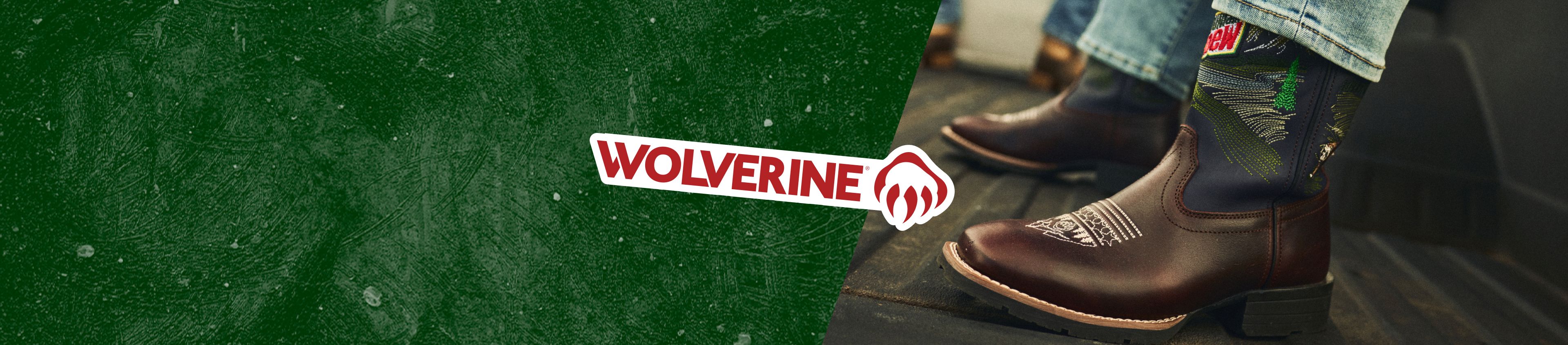 Sitting in the bed of a pickup truck wearing brown & green boots with the Mountain Dew logo on the front.