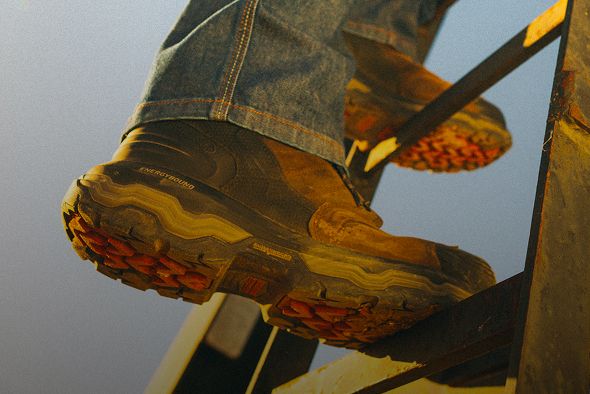 Boots climbing a ladder.