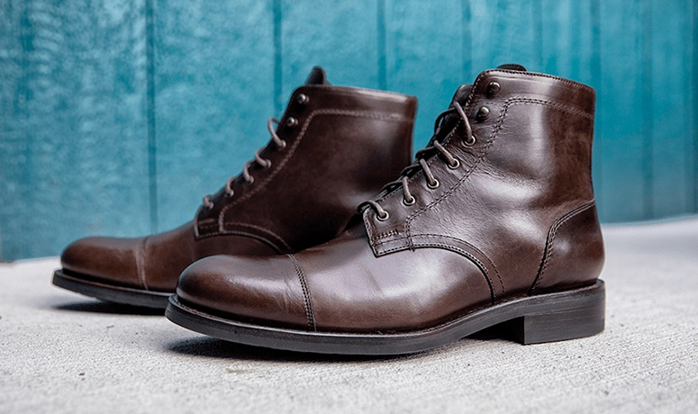 Wolverine BLVD Cap Toe in brown on a cement floor