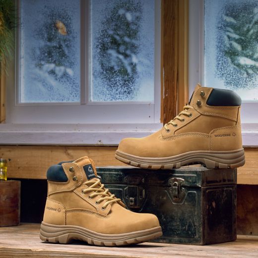 Carlsbad boots on a workbench.