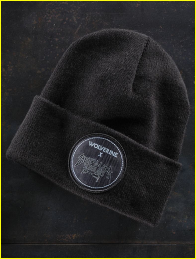 a black beanie with a logo on it