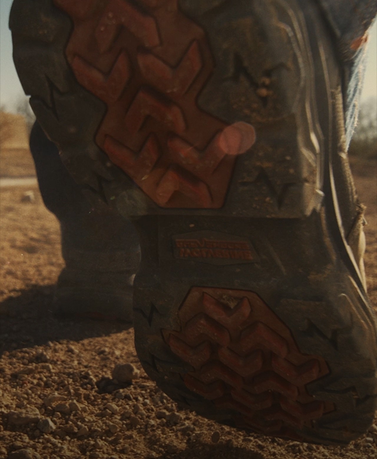 Close-up of an Infinity System work boot outsole on a jobsite.