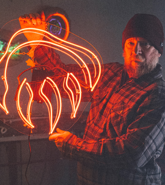 Matt displaying his Wolverine Claw neon.