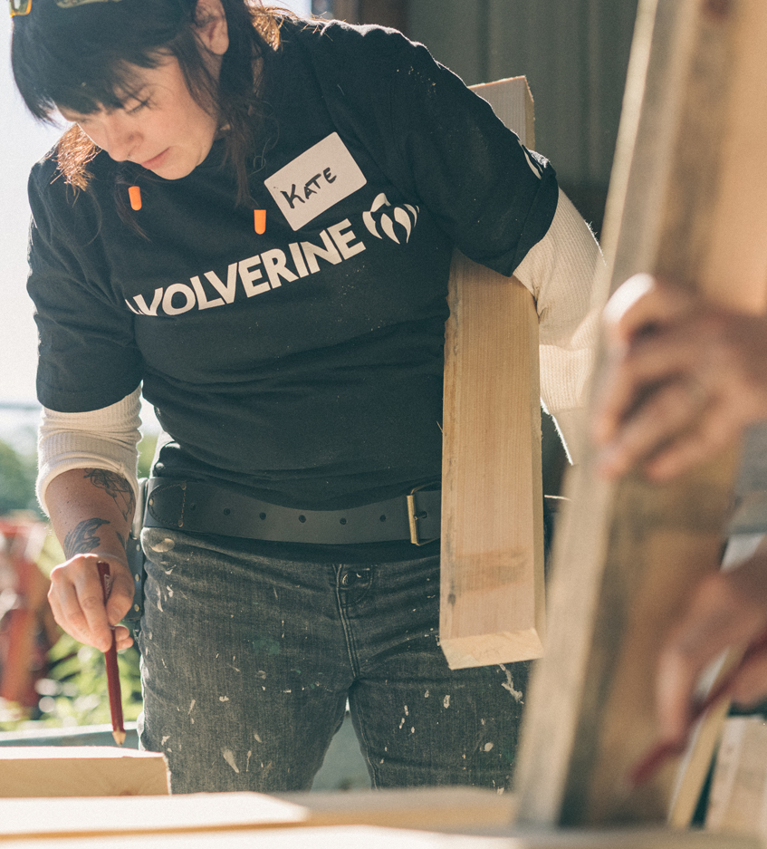 Women learning carpentry.