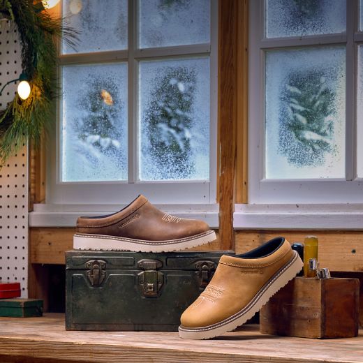 Bronc Clogs on a workbench.