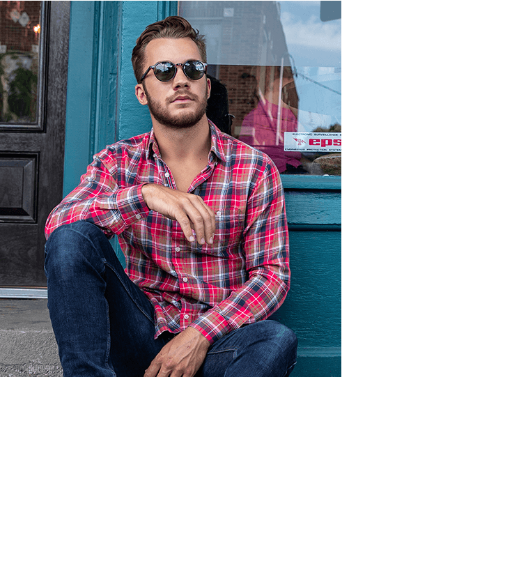 Headshot of Josh V. on the street.