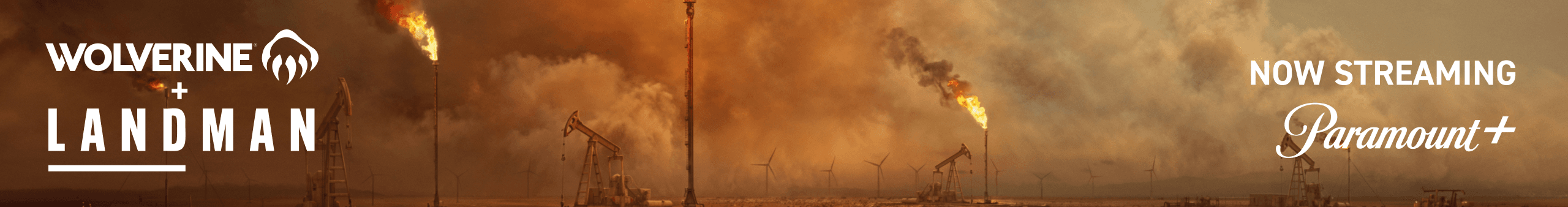 Oil derricks and gas flares.