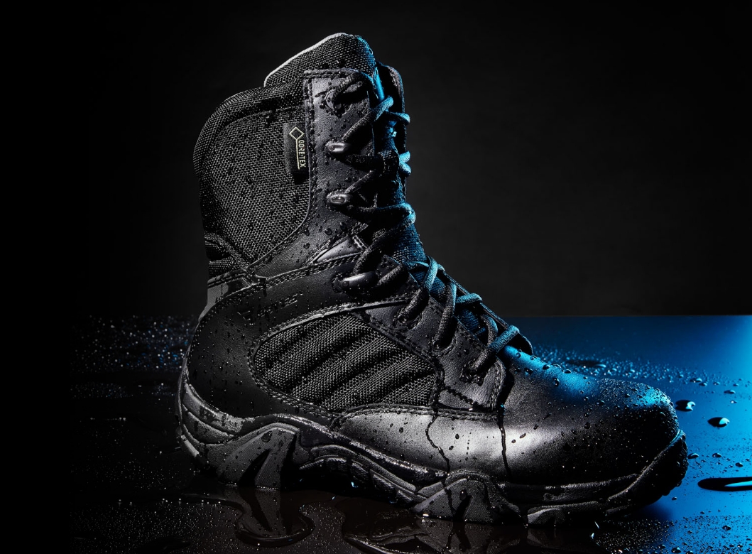 Black ankle-length boot in wet conditions.